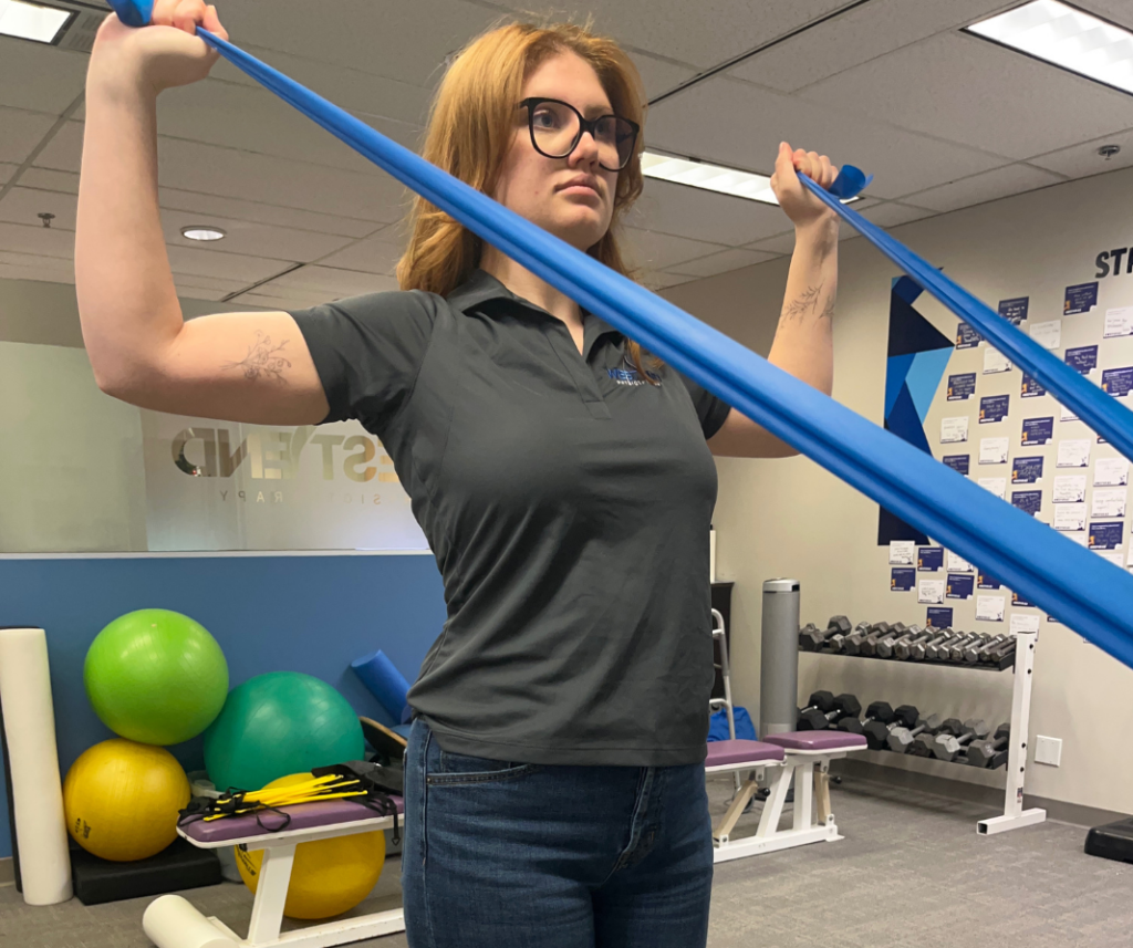 Demonstration of Shoulder rotation exercise with Theraband