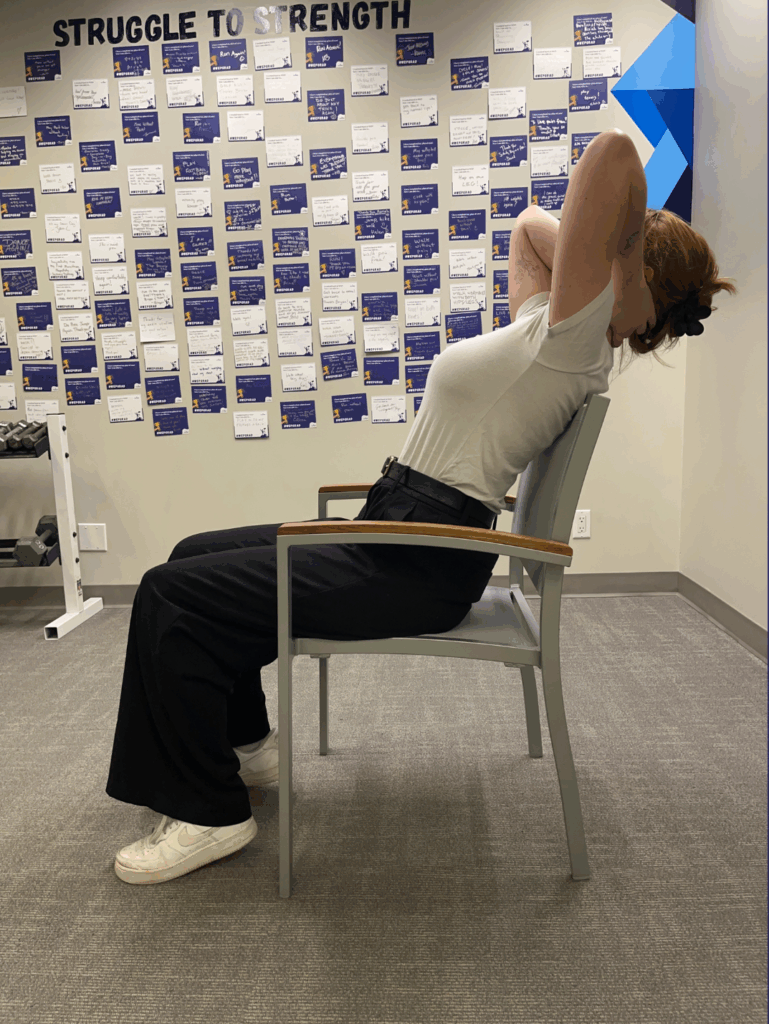 Demonstration of Seated Upper Back Extension Exercise