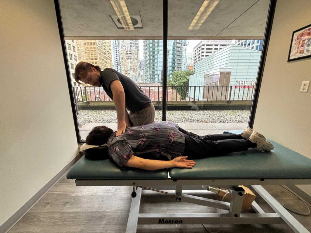 Chiropractor Dr Donny Mackintosh treating a patient
